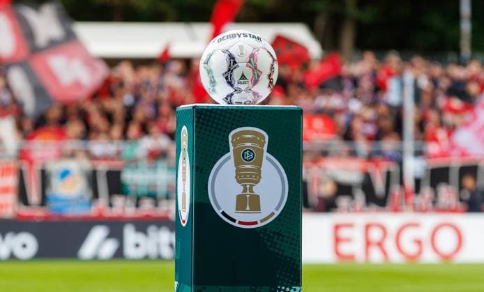22.08.2026 - Fussball - Saison 2026 2027 - DFB Pokal Vereinspokal - 01. Runde: Viktoria Köln - 1. FC Nürnberg Nuernberg FCN ( Club ) - Sportfoto Zink DaMa - xdaxmax - regulations prohibit any use of photographs as image sequences and or quasi-video - Symbolbild Symbolfoto Feature Impression - Clubfan Clubfans FCN-Fans Fans im Gästeblock - Ballsäule DFB-Pokal DFB Pokal - Werbung Ergo *** August 22, 2026 Soccer Season 2026–2027 DFB Cup Club Cup First Round Viktoria Köln 1 FC Nürnberg Nuremberg FCN Club Sports Photo Zink DaMa xdaxmax regulations prohibit any use of photographs as image sequences and or quasi-video Stock photo Symbolic photo Feature Impression Club fan Club fans FCN fans Fans in the visitors section Ball column DFB Cup DFB Cup Advertising Ergo