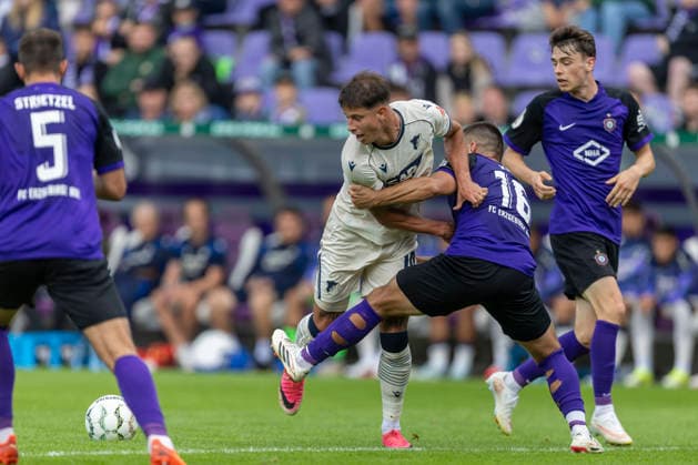 GER, Aue, Fussball, DFB-Pokal, 1. Hauptrunde, FC Erzgebirge Aue vs. TSG 1899 Hoffenheim im Bild v.l.: Adam Hlozek (TSG Hoffenheim 10), Patrick Kapp (FC Erzgebirge Aue 16), Zweikampf 22.08.2026, EINS Erzgebirgsstadion Aue DFB REGULATIONS PROHIBIT ANY USE OF PHOTOGRAPHS AS IMAGE SEQUENCES AND OR QUASI-VIDEO, *** GER, Aue, Soccer, DFB Cup, First Round, FC Erzgebirge Aue vs. TSG 1899 Hoffenheim (pictured, from left): Adam Hlozek (TSG Hoffenheim, No. 10), Patrick Kapp (FC Erzgebirge Aue, No. 16), tackle on August 22, 2026, EINS Erzgebirgsstadion Aue. DFB regulations prohibit any use of photographs as image sequences and or quasi-video, Copyright: HMBxMedia PaulxFritz
