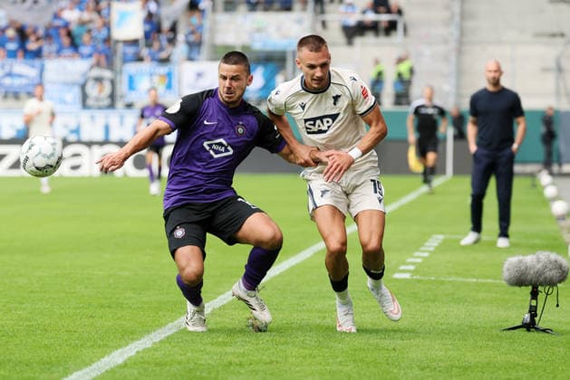 Erz.Aue - Hoffenheim DFB-Pokal Aue, 22.08.2026, Erzgebirgsstadion, Fußball, DFB Pokal, 1.Hauptrunde , FC Erzgebirge Aue vs. TSG 1899 Hoffenheim , Im Bild v.l.: Patrick Kapp (16, Aue) und Tim Lemperle ( 19, Hoffenheim) , Nur für journalistische Zwecke. Only for editorial use! , DFB regulations prohibit any use of photographs as image sequences and or quasi-video. , *** Erzgebirge Aue vs. Hoffenheim, DFB Cup, Aue, August 22, 2026, Erzgebirgsstadion, Soccer, DFB Cup, First Round, FC Erzgebirge Aue vs. TSG 1899 Hoffenheim, Pictured from left: Patrick Kapp 16, Aue, and Tim Lemperle (19), Hoffenheim; For editorial use only; DFB regulations prohibit any use of photographs as image sequences and or quasi-video, Picture Point