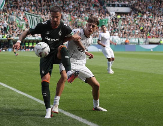 Marco Friedl (SV Werder Bremen), Tjark Doerr (Lueneburger SK Hansa) Fussball, Saison 2026 2027, Maenner, Herren, DFB Pokal, 1. Hauptrunde, Millerntor Stadion, Lueneburger SK gegen Werder Bremen DFL REGULATIONS PROHIBIT ANY USE OF PHOTOGRAPHS AS IMAGE SEQUENCES AND OR QUASI-VIDEO. *** Marco Friedl, SV Werder Bremen; Tjark Doerr, Lüneburger SK Hansa Football, 2026–2027 season, Men, Men’s, DFB Cup, 1st Round, Millerntor Stadium, Lüneburger SK vs. Werder Bremen. DFL regulations prohibit any use of photographs as image sequences and or quasi-video.
