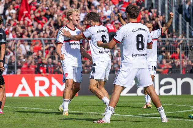 Piet Scobel (1. FC Nuernberg, 19) und Adam Markhiyev (1. FC Nuernberg, 06) bejubeln das Tor zum 1:0. Viktoria Koeln vs. 1. FC Nuernberg, Fussball, DFB-Pokal, 1. Runde, Saison 2026 2027, 22.08.2026 DFL DFB Regulations prohibit any use of Photographs as image sequences and or Quasivideo Viktoria Koeln vs. 1. FC Nuernberg, Fussball, DFB-Pokal, 1. Runde, Saison 2026 2027, 22.08.2026 Koeln *** Piet Scobel (1. FC Nuremberg, 19) and Adam Markhiyev (1. FC Nuremberg, 06) celebrate the goal that made the score 1–0 in the match between Viktoria Cologne and 1. FC Nuremberg, soccer, DFB Cup, First Round, 2026–2027 season, August 22, 2026. DFL and DFB regulations prohibit any use of photographs as image sequences and or quasi-video. Viktoria Cologne vs. 1. FC Nuremberg, soccer, DFB Cup, 1st round, 2026–2027 season, August 22, 2026, Cologne Copyright: xEibner-Pressefoto ThomasxHaeslerx EP_THR