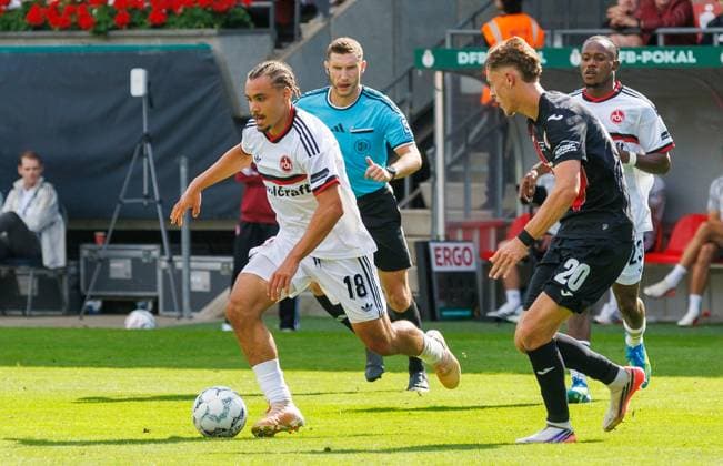 22.08.2026 - Fussball - Saison 2026 2027 - DFB Pokal Vereinspokal - 01. Runde: Viktoria Köln - 1. FC Nürnberg Nuernberg FCN ( Club ) - Sportfoto Zink DaMa - xdaxmax - regulations prohibit any use of photographs as image sequences and or quasi-video - Rafael Lubach (18, 1. FC Nürnberg FCN ) Niklas Swider (20, FC Viktoria Köln ) *** August 22, 2026 Soccer Season 2026–2027 DFB Cup Club Cup First Round Viktoria Köln vs. 1. FC Nürnberg (Nürnberg, FCN) Club Sports Photo by Zink DaMa xdaxmax regulations prohibit any use of photographs as image sequences and or quasi-video Rafael Lub18, 1. FC Nürnberg (FCN) Niklas Swider 20, FC Viktoria Köln