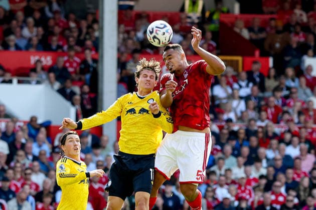 Nottingham Forest v Leeds United, Premier League Nottingham Forest defender Murillo (5) baatles for header with Leeds United midfielder Brenden Aaronson (11) during the Premier League match between Nottingham Forest and Leeds United at the City Ground, Nottingham, UK on 22 August 2026. Nottingham City Ground Nottinghamshire UK Editorial use only DataCo restrictions apply See www.football-dataco.com , Copyright: xManjitxNarotrax PSI-24717-0027