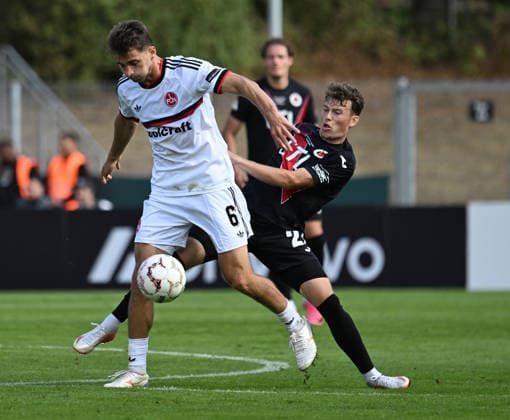 22.08.2026, xophax, Fussball , DFB - Pokal , 1.Runde Viktoria Köln gegen 1.FC Nürnberg Adam Markhiyev ( Nürnberg ), links und Mika Lucas Wolf , rechts ( Viktoria Köln ) Köln *** August 22, 2026, xophax, Soccer, DFB Cup, 1st Round: Viktoria Köln vs. 1. FC Nürnberg—Adam Markhiyev (Nürnberg, left) and Mika Lucas Wolf (Viktoria Köln, right), Cologne