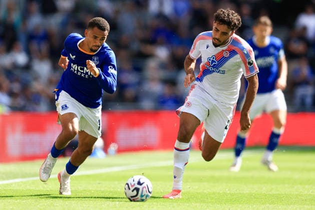 Liverpool, England, 22nd August 2026. Iliman Ndiaye of Everton is challenged by Chadi Riad of Crystal Palace during the Everton vs Crystal Palace Premier League match at Hill Dickinson Stadium, Liverpool. Picture credit should read: Jessica Hornby Sportimage EDITORIAL USE ONLY. No use with unauthorised audio, video, data, fixture lists, club league logos or live services. Online in-match use limited to 120 images, no video emulation. No use in betting, games or single club league player publications. SPI_023_JH_EVERTON_CRYSTAL_PALACE SPI-4926-0023