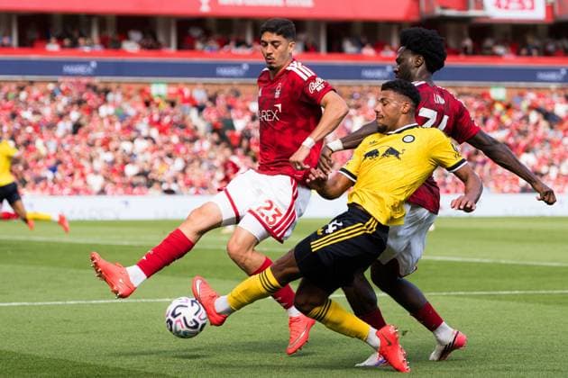 James Justin of Leeds United attempts to cross the ball and is challenged by Jair Cunha (left) and Ola Aina (right) of Nottingham Forest Nottingham Forest v Leeds United, Premier League, Football, The City Ground, Nottingham, UK - 22 Aug 2026Nottingham The City Ground United Kingdom EDITORIAL USE ONLY No use with unauthorised audio, video, data, fixture lists, club league logos or live services. Online in-match use limited to 120 images, no video emulation. No use in betting, games or single club league player publications.  Copyright: xWiredxPhotos Shutterstockx 17112526an