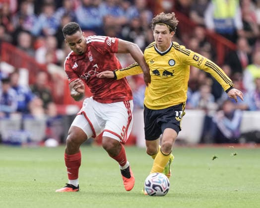 Premier League: Nottingham Forest v Leeds United Murillo of Nottingham Forest and Brenden Aaronson of Leeds United battle for the ball during the Premier League match Nottingham Forest vs Leeds United at City Ground, Nottingham, United Kingdom on 22 August 2026 (Photo by Maynard Manyowa News Images) Nottingham City Ground Nottinghamshire United Kingdom Copyright: xMaynardxManyowa NewsxImagesx