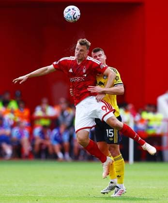Chris Wood of Nottingham Forest and Jaka Bijol of Leeds United Nottingham Forest v Leeds United, Premier League Football, Football, City Ground, Nottingham, UK - 22 Aug 2026Nottingham City Ground United Kingdom EDITORIAL USE ONLY No use with unauthorised audio, video, data, fixture lists, club league logos or live services. Online in-match use limited to 120 images, no video emulation. No use in betting, games or single club league player publications.  Copyright: xMattxWest Shutterstockx 17111732aj
