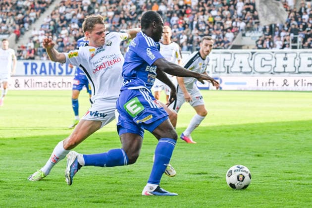 SOCCER - BL, Altach vs Hartberg ALTACH,AUSTRIA,22.AUG.26 - SOCCER - ADMIRAL Bundesliga, SCR Altach vs TSV Hartberg. Image shows Benjamin Boeckle (Altach) and Youba Diarra (Hartberg).  GEPAxpictures xOliverxLerch