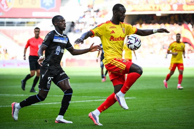 August 22, 2026, Lens, France, France: Lamine SY of Auxerre and Abdallah SIMA of Lens during the Ligue 1 match between RC Lens and AJ Auxerre at Bollaert-Delelis Stadium on August 22, 2026 in Lens, France. RC Lens V AJ Auxerre - Ligue 1  - ZUMAm308 20260822_zsp_m308_005 Copyright: xMatthieuxMirvillex