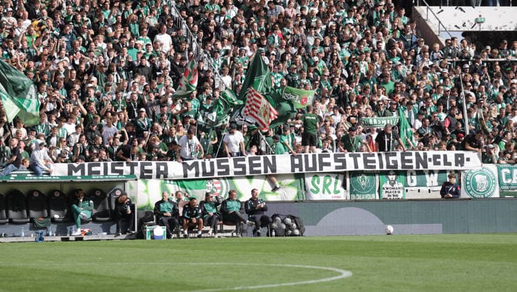 Banner der Werder Fans Meister muessen aufsteigen Fussball, Saison 2026 2027, Maenner, Herren, DFB Pokal, 1. Hauptrunde, Millerntor Stadion, Lueneburger SK gegen Werder BremenÂ , 0-3 DFL REGULATIONS PROHIBIT ANY USE OF PHOTOGRAPHS AS IMAGE SEQUENCES AND OR QUASI-VIDEO. *** Banner from Werder fans: Champions Must Be Promoted Soccer, 2026–2027 Season, Men, Men’s, DFB Cup, 1st Round, Millerntor Stadium, Lüneburger SK vs. Werder Bremen, 0–3. DFL regulations prohibit any use of photographs as image sequences and or quasi-video.