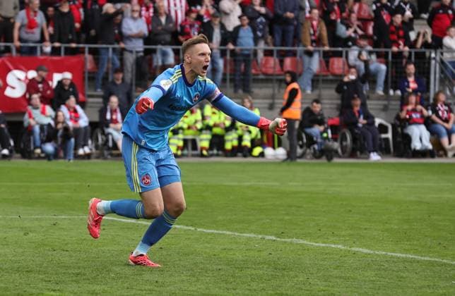 22.08.2026 - Fussball - Saison 2026 2027 - DFB Pokal Vereinspokal - 01. Runde: Viktoria Köln - 1. FC Nürnberg Nuernberg FCN ( Club ) - Sportfoto Zink DaMa - xdaxmax - regulations prohibit any use of photographs as image sequences and or quasi-video - Jubel Freude nach Spielende - Jan Reichert (1, 1. FC Nürnberg FCN ) jubelt Jubel nach gehaltenen Elfmeter im Elfmeterschießen - nach Sieg des FCN *** August 22, 2026 Soccer Season 2026–2027 DFB Cup Club Cup Round 1 Viktoria Cologne 1 FC Nuremberg Nuremberg FCN Club Sports Photo Zink DaMa xdaxmax regulations prohibit any use of photographs as image sequences and or quasi-video celebrationsJubilation after the game ends Jan Reichert 1, 1. FC Nürnberg (FCN) celebrates Jubilation after a saved penalty kick in the penalty shootout following FCN s victory