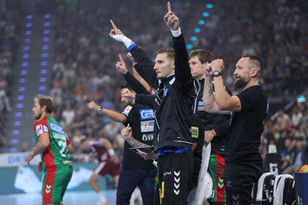 22.08.2026, xgox, Handball, Rexel Supercup 2026, SC Magdeburg - Füchse Berlin, v.l. Dominik Kuzmanovic (Magdeburg, 1) Jubelt ueber gehaltenen Ball, abgewehrt, gehalten, Torhueter München *** August 22, 2026, xgox, Handball, 2026 Rexel Supercup, SC Magdeburg vs. Füchse Berlin, from left: Dominik Kuzmanovic (Magdeburg), celebrating a saved shot, blocked, saved, Munich goalkeeper