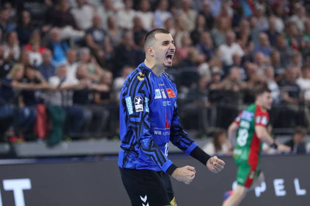 22.08.2026, xgox, Handball, Rexel Supercup 2026, SC Magdeburg - Füchse Berlin, v.l. Matej Mandic (Magdeburg, 12) Jubelt ueber gehaltenen Ball, abgewehrt, gehalten, Torhueter München *** August 22, 2026, xgox, Handball, 2026 Rexel Supercup, SC Magdeburg vs. Füchse Berlin, from left: Matej Mandic (Magdeburg), 12 celebrating a saved shot, blocked, saved, Munich goalkeeper