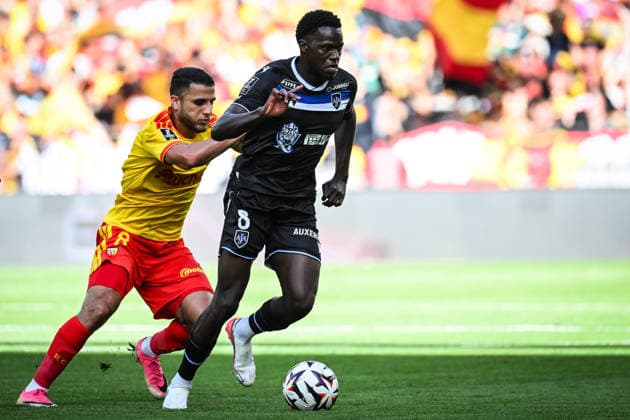 August 22, 2026, Lens, France, France: Yassine TITRAOUI of Lens and Naouirou AHAMADA of Auxerre during the Ligue 1 match between RC Lens and AJ Auxerre at Bollaert-Delelis Stadium on August 22, 2026 in Lens, France. RC Lens V AJ Auxerre - Ligue 1  - ZUMAm308 20260822_zsp_m308_006 Copyright: xMatthieuxMirvillex