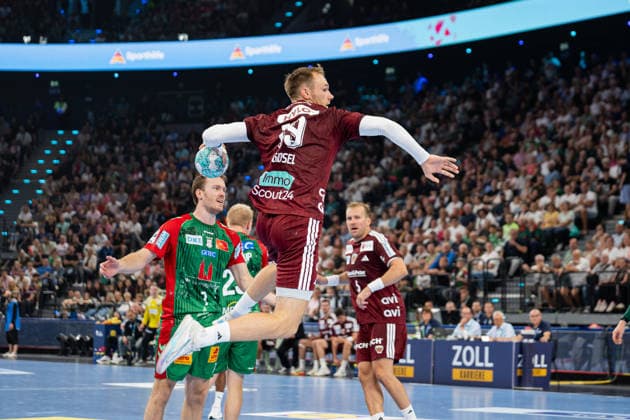 Fuechse Berlin (GER) vs SC Magdeburg (GER), Handball, 1. Handball Bundesliga Herren, Rexel Supercup 2026, Saison 2026 2027, Muenchen, 22.08.2026 Mathias Gidsel (Fuechse Berlin, 19) im Torwurf Muenchen SAP Garden Deutschland *** Fuechse Berlin GER vs. SC Magdeburg GER, Handball, Men s Handball Bundesliga 1, Rexel Supercup 2026, 2026–2027 Season, Munich, August 22, 2026 Mathias Gidsel, Fuechse Berlin, 19, scoring from the goal throw at Munich SAP Garden, Germany