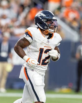 August 22, 2026, Denver, Colorado, USA: Broncos RB RJ HARVEY jogs to the bench after scoring his teams first TD of the night during the 1st. Half at Empower Field at Mile High Friday evening. Packers beat the Broncos in Pre-Season 33-13. Credit Image: ZUMA Press Wire) NFL, American Football Herren, USA Pre-Season 2026 - Packers Beat The Broncos In Pre-Season 33-13 Friday Evening.  - ZUMAav4_ 20260822_zaf_av4_044 Copyright: xHectorxAcevedox