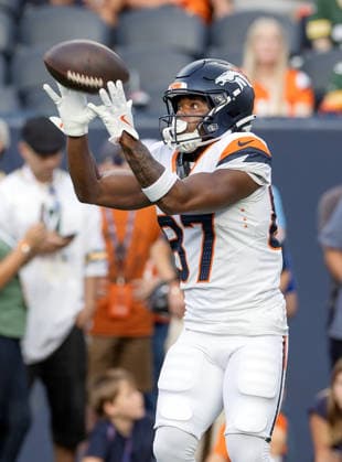 August 22, 2026, Denver, Colorado, USA: Broncos WR CAMERON ROSS catches a pass during warm-ups during the 1st. Half at Empower Field at Mile High Friday evening. Packers beat the Broncos in Pre-Season 33-13. Credit Image: ZUMA Press Wire) Denver USA - ZUMAav4_ 20260822_zaf_av4_001 Copyright: xHectorxAcevedox