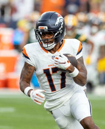 August 22, 2026, Denver, Colorado, USA: Broncos WR JAYLEN WADDLE starts his run up field after a catch during the 1st. Half at Empower Field at Mile High Friday evening. Packers beat the Broncos in Pre-Season 33-13. Credit Image: ZUMA Press Wire) Denver USA - ZUMAav4_ 20260822_zaf_av4_005 Copyright: xHectorxAcevedox