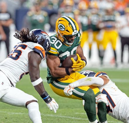 August 22, 2026, Denver, Colorado, USA: Packers RB CHRIS BROOKS gets tough yards during the 1st. Half at Empower Field at Mile High Friday evening. Packers beat the Broncos in Pre-Season 33-13. Credit Image: ZUMA Press Wire) Denver USA - ZUMAav4_ 20260822_zaf_av4_011 Copyright: xHectorxAcevedox