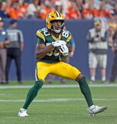 August 22, 2026, Denver, Colorado, USA: Packers WR ISIAH NEYOR looks to run upfield as he catches a pass during the 2nd. Half at Empower Field at Mile High Friday evening. Packers beat the Broncos in Pre-Season 33-13. Credit Image: ZUMA Press Wire) Denver USA - ZUMAav4_ 20260822_zaf_av4_015 Copyright: xHectorxAcevedox