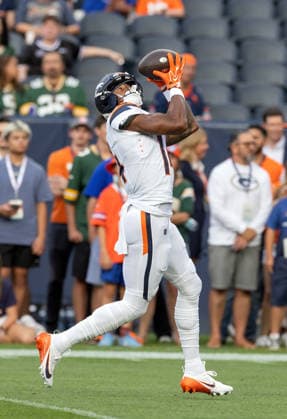August 22, 2026, Denver, Colorado, USA: Broncos WR COURTLAND SUTTON catches a pass during warm-ups during the 1st. Half at Empower Field at Mile High Friday evening. Packers beat the Broncos in Pre-Season 33-13. Credit Image: ZUMA Press Wire) Denver USA - ZUMAav4_ 20260822_zaf_av4_019 Copyright: xHectorxAcevedox