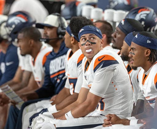 August 22, 2026, Denver, Colorado, USA: Broncos WR KOLBE KATSIS looks on from the bench during the 2nd. Half at Empower Field at Mile High Friday evening. Packers beat the Broncos in Pre-Season 33-13. Credit Image: ZUMA Press Wire) Denver USA - ZUMAav4_ 20260822_zaf_av4_028 Copyright: xHectorxAcevedox