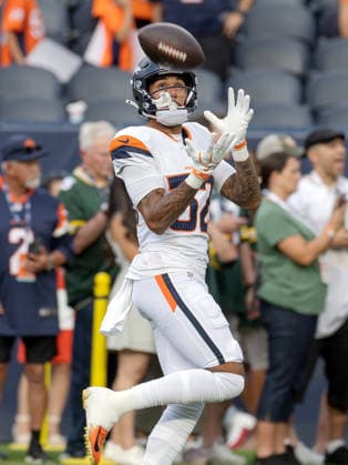 August 22, 2026, Denver, Colorado, USA: Broncos TE ADAM TRAUTMAN catches a pass during warm-ups during the 1st. Half at Empower Field at Mile High Friday evening. Packers beat the Broncos in Pre-Season 33-13. Credit Image: ZUMA Press Wire) Denver USA - ZUMAav4_ 20260822_zaf_av4_033 Copyright: xHectorxAcevedox