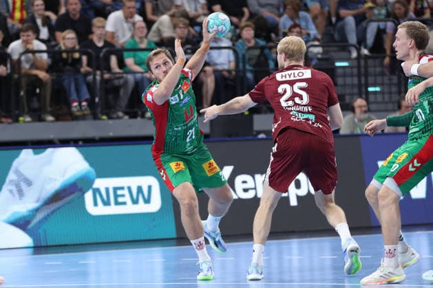 22.08.2026, xgox, Handball, Rexel Supercup 2026, SC Magdeburg - Füchse Berlin, v.l. Albin Lagergren (Magdeburg, 21) wirft Tor, Torschuetze, erzielt Tor, Treffer, scores the goal München *** August 22, 2026, xgox, Handball, 2026 Rexel Supercup, SC Magdeburg vs. Füchse Berlin, from left: Albin Lagergren (Magdeburg), 21, takes a shot, goal scorer, scores a goal, Munich