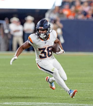 August 22, 2026, Denver, Colorado, USA: Broncos RB JALEEL MCLAUGHLIN runs for big yardage during the 2nd. Half at Empower Field at Mile High Friday evening. Packers beat the Broncos in Pre-Season 33-13. Credit Image: ZUMA Press Wire) Denver USA - ZUMAav4_ 20260822_zaf_av4_050 Copyright: xHectorxAcevedox