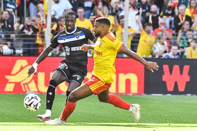 FOOTBALL : RC Lens vs AJ Auxerre - Ligue 1 - JournÃ e 1- 22 08 2026 Lamine Sy (AJ Auxerre) Matthieu Udol (RC Lens) LensFrance  Copyright: xBaptistexAutissierx