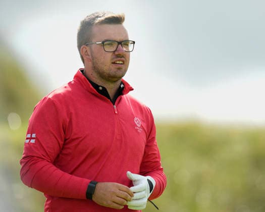 BALMEDIE, SCOTLAND - AUG 22: Eliot Baker (a) (ENG) walks from the eleventh tee during Round 3 at the 2026 Nexo Championship at the Trump International Golf Links, Balmedie on August 22, 2026 in Aberdeenshire, Scotland The 2026 Nexo Championship