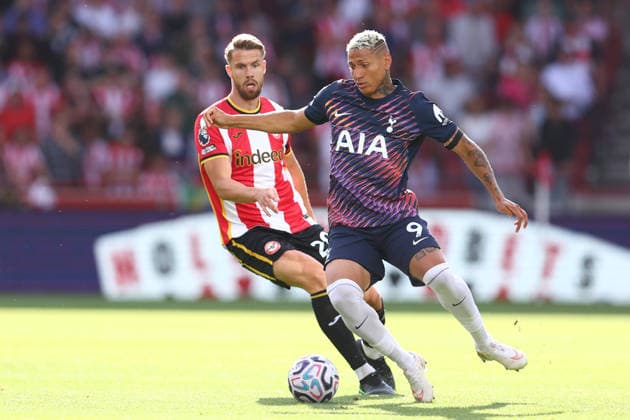 London, England, 22nd August 2026. Kristoffer Ajer of Brentford and Richarlison of Tottenham Hotspur challenge for the ball during the Brentford vs Tottenham Hotspur Premier League match at Gtech Community Stadium, London. Picture credit should read: Paul Terry Sportimage EDITORIAL USE ONLY. No use with unauthorised audio, video, data, fixture lists, club league logos or live services. Online in-match use limited to 120 images, no video emulation. No use in betting, games or single club league player publications. SPI_027_PT_Brentford_Tottenham SPI-4927-0027
