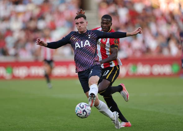 RECORD DATE NOT STATED 22nd August 2026; Gtech Community Stadium, Brentford, London, England; Premier League Football, Brentford versus Tottenham Hotspur; Andrew Robertson of Tottenham Hotspur under pressure from Dango Ouattara of Brentford JohnxPatrickxFletcher