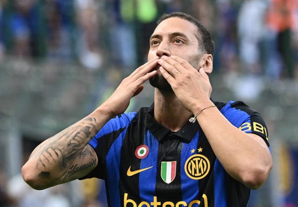 Inter v Monza - Serie A MILAN, ITALY, AUGUST 22: Inter Milan s Hakan Calhanoglu celebrates after scores his team s first goal during the Italian serie A football match between Inter Milan and Monza at San Siro Meazza stadium in Milan, Italy, on August 22, 2026. Isabella Bonotto Anadolu Milan Italy. Editorial use only. Please get in touch for any other usage.  Copyright: x2026xAnadoluxIsabellaxBonottox