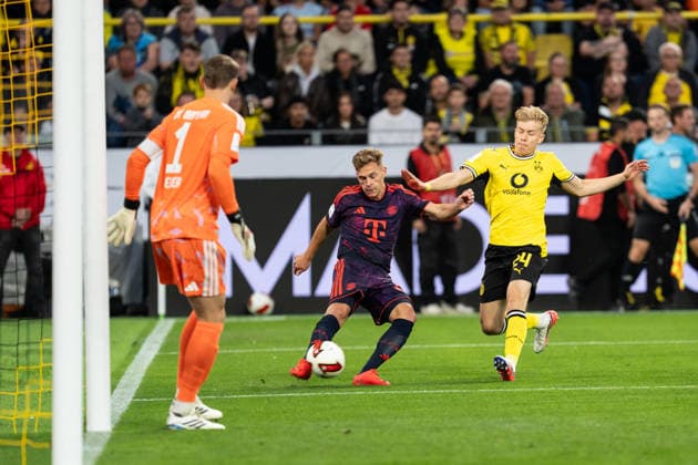 22.08.2026, GER Deutschland, Fussball, Saison 2026 2027, Franz Beckenbauer Supercup - Borussia Dortmund vs FC Bayern München Muenchen Zweikampf zwischen Joshua Kimmich (FC Bayern München Muenchen, 6) und Daniel Svensson (Borussia Dortmund, 24) Manuel Neuer (FC Bayern München Muenchen, 1) Dortmund Signal Iduna Park Nordrhein-Westfalen (NRW) Deutschland *** August 22, 2026, GER Germany, Soccer, 2026–2027 Season, Franz Beckenbauer Super Cup: Borussia Dortmund vs. FC Bayern Munich. Head-to-head between Joshua Kimmich (FC Bayern Munich, No. 6) and Daniel Svensson (Borussia Dortmund, No. 24). Manuel Neuer (FC Bayern Munich, No. 1). Dortmund, Signal Iduna Park, North Rhine-Westphalia (NRW), Germany Copyright: xnordphotoxGmbHx xChristianxSchulzex