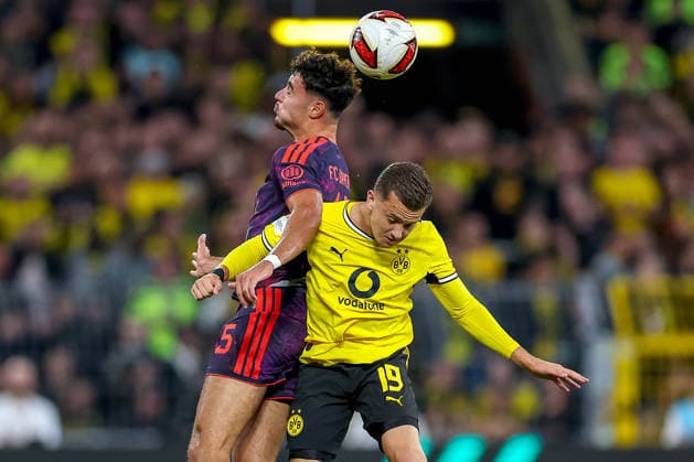 22.08.2026, Fußball, Borussia Dortmund - FC Bayern München, Signal Iduna Park, Saison 2026 2027: Aleksandar Pavlovic (FC Bayern München 45) im Zweikampf gegen Konstantinos Karetsas (BVB 19) DFB regulations prohibit any use of photographs as image sequences and or quasi-video. Nordrhein-Westfalen Deutschland *** August 22, 2026, Soccer, Borussia Dortmund vs. FC Bayern Munich, Signal Iduna Park, 2026–2027 season: Aleksandar Pavlovic (FC Bayern Munich, No. 45) in a tackle against Konstantinos Karetsas (BVB, No. 19). DFB regulations prohibit any use of photographs as image sequences and or quasi-video. North Rhine-Westphalia, Germany
