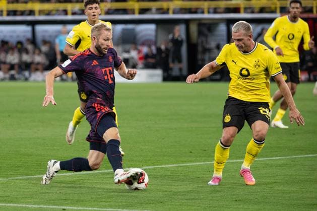 Konrad Laimer 27 (FC Bayern Muenchen) im Zweikampf mit Julian Ryerson 26 (Borussia Dortmund), Borussia Dortmund vs. FC Bayern Muenchen, Fussball, Franz Beckenbauer Supercup, 22.08.2026 DFB regulations prohibit any use of photographs as image sequences and or quasi-video Dortmund Nordrhein-Westfalen Deutschland *** Konrad Laimer, 27, FC Bayern Munich, in a tackle with Julian Ryerson, 26, Borussia Dortmund; Borussia Dortmund vs. FC Bayern Munich, soccer, Franz Beckenbauer Super Cup, August 22, 2026. DFB regulations prohibit any use of photographs as image sequences and or quasi-video. Dortmund, North Rhine-Westphalia, Germany Copyright: xkolbert-press MarcxNiemeyerx