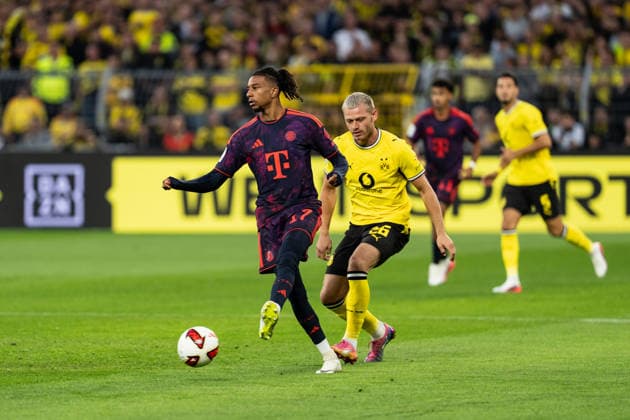 22.08.2026, GER Deutschland, Fussball, Saison 2026 2027, Franz Beckenbauer Supercup - Borussia Dortmund vs FC Bayern München Muenchen Zweikampf zwischen Michael Olise (FC Bayern München Muenchen, 17) und Julian Ryerson (Borussia Dortmund, 26) Dortmund Signal Iduna Park Nordrhein-Westfalen (NRW) Deutschland *** August 22, 2026, GER Germany, Soccer, 2026–2027 season, Franz Beckenbauer Super Cup: Borussia Dortmund vs. FC Bayern Munich, a matchup between Michael Olise (FC Bayern Munich, age 17) and Julian Ryerson (Borussia Dortmund, age 26), Dortmund, Signal Iduna Park, North Rhine-Westphalia (NRW), Germany Copyright: xnordphotoxGmbHx xChristianxSchulzex