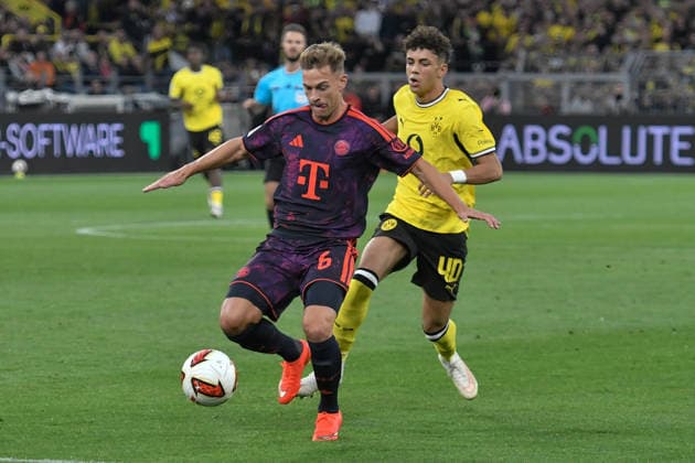 v. li. im Zweikampf Joshua Kimmich (Bayern 6) Samuele Inacio (Dortmund 40) 22.08.2026 ¢ Fussball ¢ Borussia Dortmund vs FC Bayern München ¢ Super Cup, Signal Iduna Park, Dortmund, DFB DFL REGULATIONS PROHIBIT ANY USE OF PHOTOGRAPHS AS IMAGE SEQUENCES AND OR QUASI-VIDEO NRW Germany *** From left: Joshua Kimmich (Bayern 6) and Samuele Inacio (Dortmund 40) in a one-on-one battle, August 22, 2026 ¢ Soccer ¢ Borussia Dortmund vs. FC Bayern Munich ¢ Super Cup, Signal Iduna Park, Dortmund, DFB and DFL regulations prohibit any use of photographs as image sequences and or quasi-video. NRW, Germany Copyright: xpepphotox xSaschaxWeizx pep00321, pep_20260822_hm