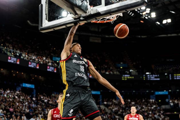 HAMBURG, GERMANY - AUGUST 22: Louis Olinde (Germany, 16) dunking the ball during the Turkish Airlines Basketball Supercup final match between Germany vs. Croatia at Barclays Arena on August 22, 2026 in Hamburg, Germany. Hamburg Germany Copyright: xSteffiexWunderlx
