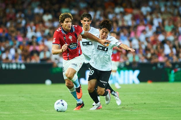 Marcos Alonso (RC Celta Vigo) and Ryunosuke Sato (Valencia CF) during the LaLiga EA Sports match between Valencia CF and RC Celta de Vigo at Mestalla on August 22, 2026 in Valencia, Spain. - *** Marcos Alonso of RC Celta Vigo and Ryunosuke Sato of Valencia CF during the LaLiga EA Sports match between Valencia CF and RC Celta de Vigo at Mestalla on August 22, 2026, in Valencia, Spain