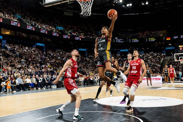 HAMBURG, GERMANY - AUGUST 22: Maodo Lo (Germany, 4) shooting the ball during the Turkish Airlines Basketball Supercup final match between Germany vs. Croatia at Barclays Arena on August 22, 2026 in Hamburg, Germany. Hamburg Germany Copyright: xSteffiexWunderlx