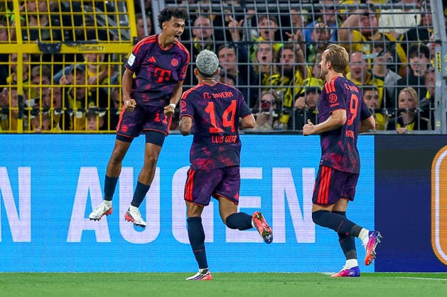 22.08.2026, Fußball, Borussia Dortmund - FC Bayern München, Signal Iduna Park, Saison 2026 2027: Torjubel nach dem Tor zum 1.0 durch Torschütze Nathaniel Brown (FC Bayern München 11) zusammen mit Luis Diaz (FC Bayern München 14) Harry Kane (FC Bayern München 09) DFB regulations prohibit any use of photographs as image sequences and or quasi-video. Nordrhein-Westfalen Deutschland *** August 22, 2026, Soccer, Borussia Dortmund vs. FC Bayern Munich, Signal Iduna Park, 2026–2027 season: Goal celebration after the 1–0 goal scored by Nathaniel Brown (FC Bayern Munich 11), alongside Luis Diaz (FC Bayern Munich 14) and Harry Kane (FC Bayern Munich 09). DFB regulations prohibit any use of photographs as image sequences and or quasi-video. North Rhine-Westphalia, Germany