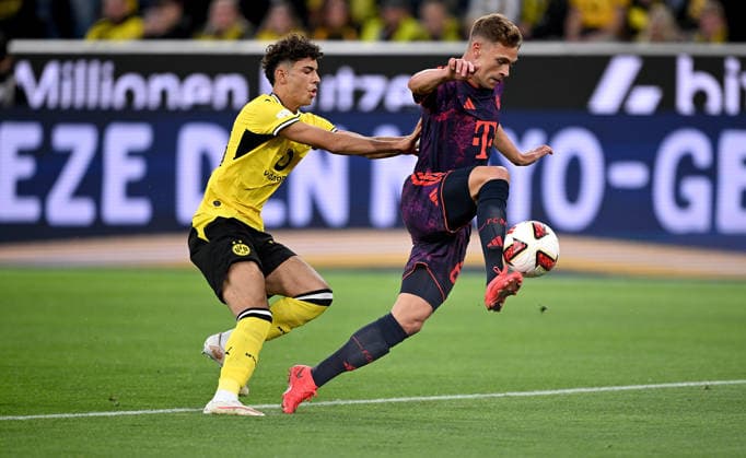 Fussball Supercup Saison 2026 2027 22.08.2026 Borussia Dortmund - FC Bayern Muenchen Samuele Inacio (li, Borussia Dortmund) gegen Joshua Kimmich (re, FC Bayern Muenchen) *** Soccer Super Cup, 2026–2027 Season, August 22, 2026: Borussia Dortmund vs. FC Bayern Munich—Samuele Inacio (left), Borussia Dortmund, vs. Joshua Kimmich (right), FC Bayern Munich
