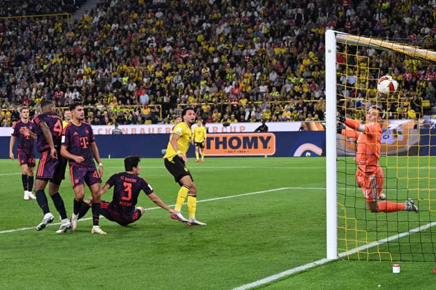 Ramy Bensebaini (Borussia Dortmund) Tor zum 1:1 zaehlt nicht wegen Abseits nach VAR Entscheid waehrend des Franz-Beckenbauer-Supercup Endspiel 2026 zwischen Borussia Dortmund und FC Bayern Muenchen, Signal Iduna Park am 22. August 2026 in Dortmund, Deutschland. (Foto von Ralf Treese DeFodi Images) +++ Ramy Bensebaini (Borussia Dortmund) scores his team™s first goal, but offsider decision after VAR during the Franz Beckenbauer Supercup match between Borussia Dortmund and FC Bayern Muenchen at Signal Iduna Park on August 22, 2026 in Dortmund, Germany. (Photo by Ralf Treese DeFodi Images) - *** Ramy Bensebaini s goal for Borussia Dortmund to make it 1-1 does not count due to offside following a VAR decision during the 2026 Franz Beckenbauer Super Cup final between Borussia Dortmund and FC Bayern Munich at Signal Iduna Park on August 22, 2026, in Dortmund, Germany. Photo by Ralf Treese, DeFodi Images. Ramy Bensebaini of Borussia Dortmund scores his team’s first goal, but it is ruled offside following a VAR review during the Franz Beckenbauer Super Cup match between Borussia Dortmund and FC Bayern Munich at Signal Iduna Park on August 22, 2026 in Dortmund, Germany. Photo by Ralf Treese, DeFodi Images