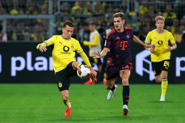 Franz Beckenbauer Supercup 2026 - Borussia Dortmund - FC Bayern München am 22.08.2026 im Signal Iduna Park in Dortmund, Konstantinos Karetsas (Dortmund 19) und Josip Stanisic (Muenchen 44) kämpfen um den Ball. *** 2026 Franz Beckenbauer Super Cup: Borussia Dortmund vs. FC Bayern Munich on August 22, 2026, at Signal Iduna Park in Dortmund; Konstantinos Karetsas (Dortmund, 19) and Josip Stanisic (Munich, 44) battle for the ball MH