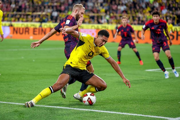 22.08.2026, Fußball, Borussia Dortmund - FC Bayern München, Signal Iduna Park, Saison 2026 2027: Konrad Laimer (FC Bayern München 27) im Zweikampf gegen Jobe Bellingham (BVB 07) DFB regulations prohibit any use of photographs as image sequences and or quasi-video. Nordrhein-Westfalen Deutschland *** August 22, 2026, Soccer, Borussia Dortmund vs. FC Bayern Munich, Signal Iduna Park, 2026–2027 season: Konrad Laimer (FC Bayern Munich, No. 27) in a tackle against Jobe Bellingham (BVB, No. 07). DFB regulations prohibit any use of photographs as image sequences and or quasi-video. North Rhine-Westphalia, Germany