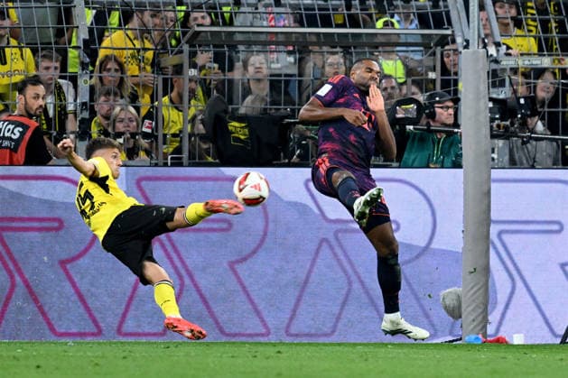22.08.2026, xsltx, Fussball Franz Beckenbauer Supercup 2026, Borussia Dortmund - FC Bayern München v.l. Giannis Konstantelias (Borussia Dortmund) Jonathan Tah (FC Bayern Muenchen) Zweikampf, Aktion, action, battle for the ball (DFL DFB REGULATIONS PROHIBIT ANY USE OF PHOTOGRAPHS as IMAGE SEQUENCES and or QUASI-VIDEO) Dortmund *** August 22, 2026, xsltx, Soccer Franz Beckenbauer 2026 Super Cup, Borussia Dortmund, FC Bayern Munich, v. l. Giannis Konstantelias, Borussia Dortmund, Jonathan Tah, FC Bayern Munich, tackle, action, battle for the ball. DFL and DFB regulations prohibit any use of photographs as image sequences and or quasi-video. Dortmund