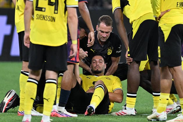 22.08.2026, xsltx, Fussball Franz Beckenbauer Supercup 2026, Borussia Dortmund - FC Bayern München v.l. Ramy Bensebaini (Borussia Dortmund) verletzt, Verletzung, Schmerz, Schmerzen (DFL DFB REGULATIONS PROHIBIT ANY USE OF PHOTOGRAPHS as IMAGE SEQUENCES and or QUASI-VIDEO) Dortmund *** August 22, 2026, xsltx, Soccer Franz Beckenbauer 2026 Super Cup, Borussia Dortmund vs. FC Bayern Munich: Ramy Bensebaini of Borussia Dortmund injured, injury, pain, DFL and DFB regulations prohibit any use of photographs as image sequences and or quasi-video, Dortmund